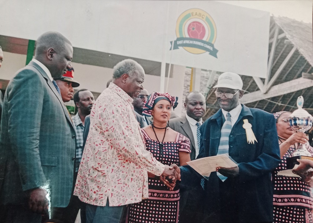 Former President Kibaki Awards us an  award in recognition of our efforts promoting  in Conservation of environment